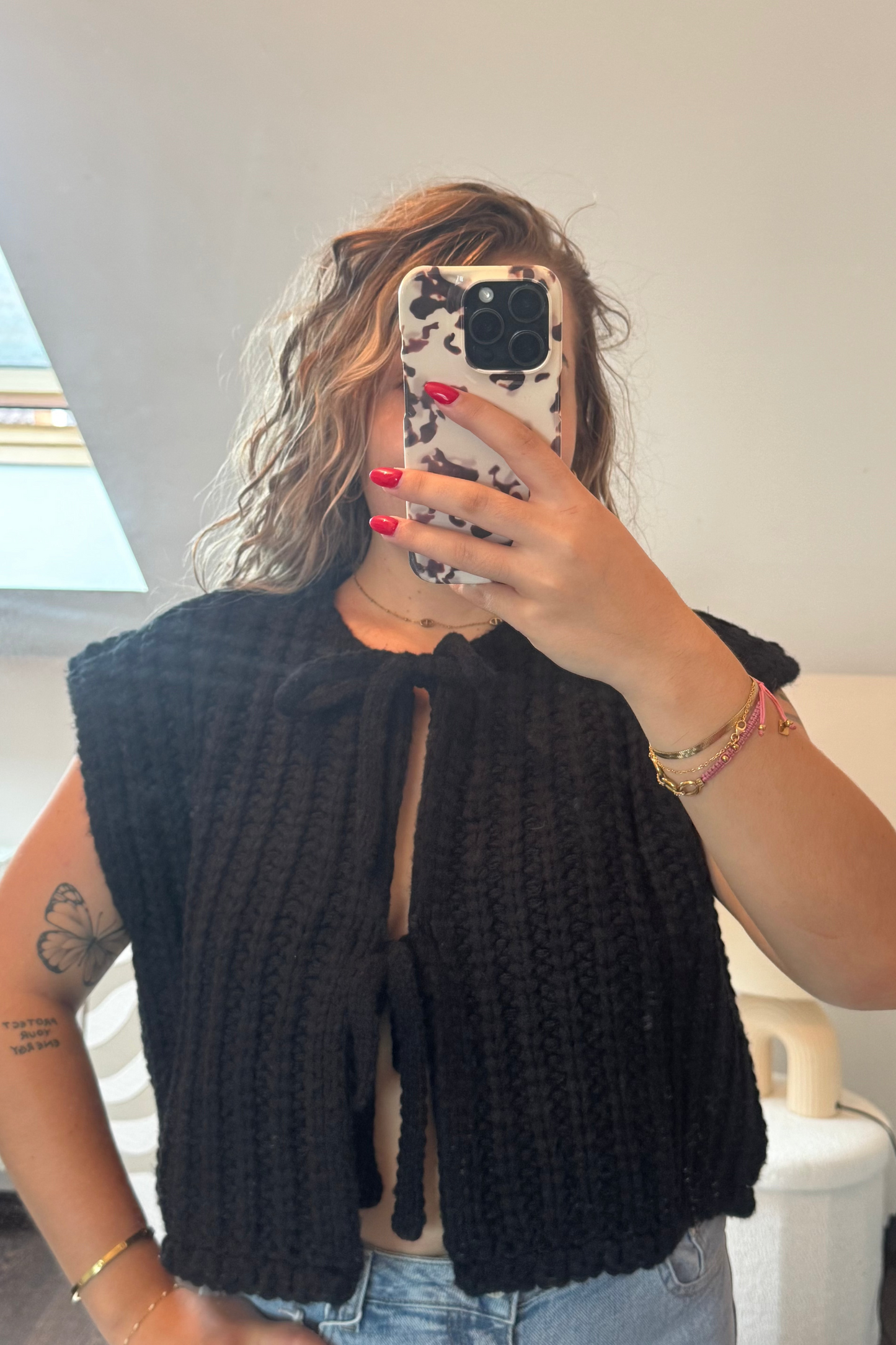 PULL COLINE SANS MANCHES NOIR