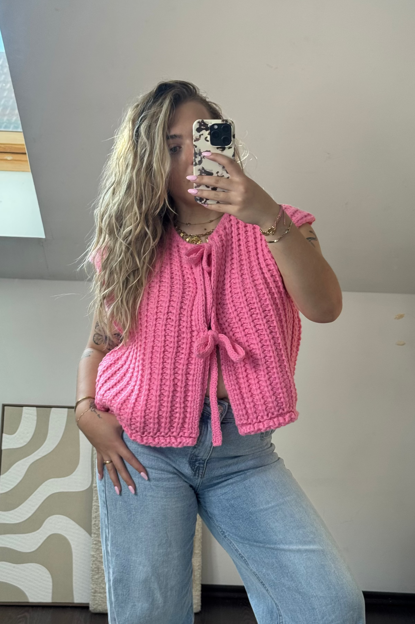 PULL COLINE SANS MANCHES ROSE